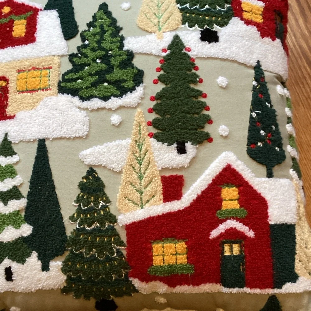 Cozy Holiday Village Pillow with Red and Green Design